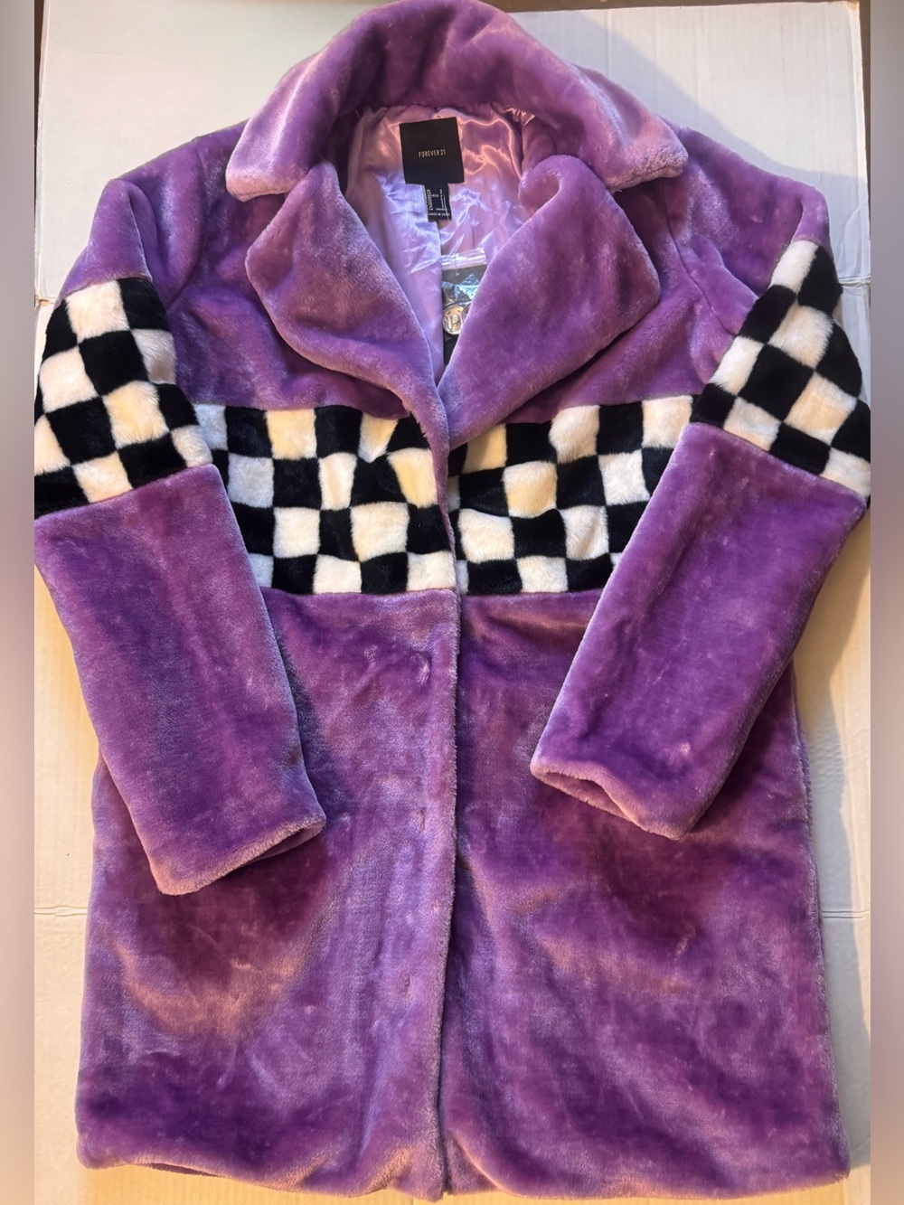 Woman’s light Purple Faux-Fur Coat with Checkerboard Trim
